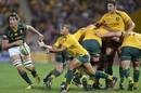Australia's Will Genia passes the ball