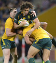 South Africa's Zane Kirchner is shackled by the Australia defence