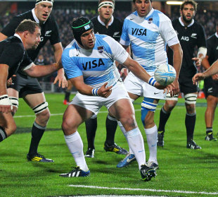Argentina's Marcos Ayerza off loads the ball, New Zealand v Argentina, The Rugby Championship, Waikato Stadium, Hamilton, September 7, 2013