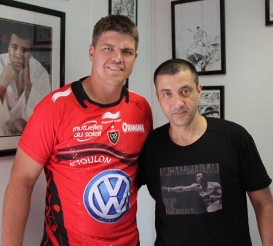 Toulon owner Mourad Boudjellal stands alongside new signing Juan Smith