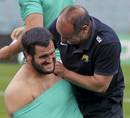 Argentina prop Juan Figallo receives some treatment in training