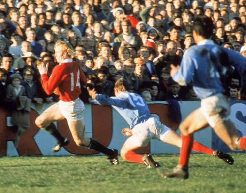 David Duckham of the British Lions runs in a try 
