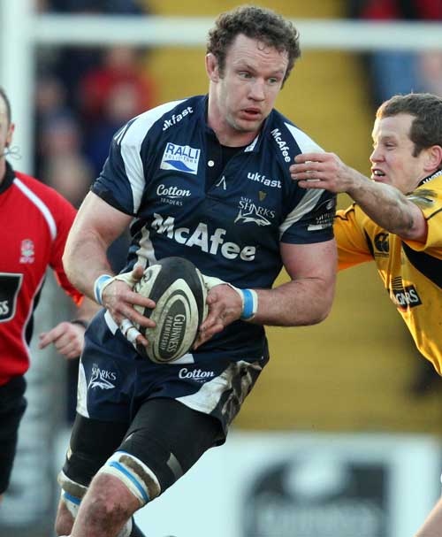Sale Sharks' Jason White is tackled by Wasps' Dave Walder 