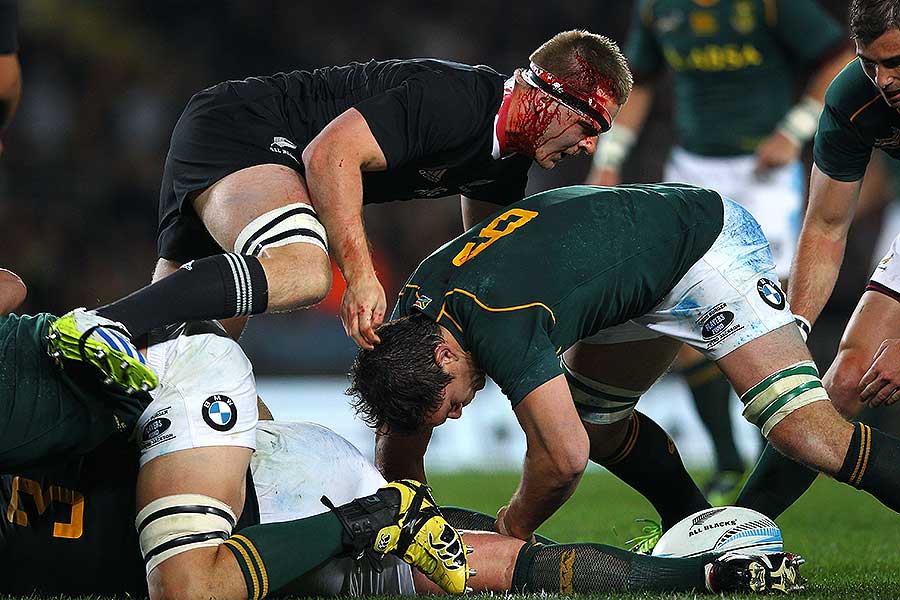 New Zealand's Sam Cane challenges at a ruck