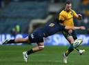 Australia's Nic White tries to nudge the ball through