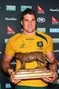 Australia's Ben Mowen shows off the Pumas Trophy