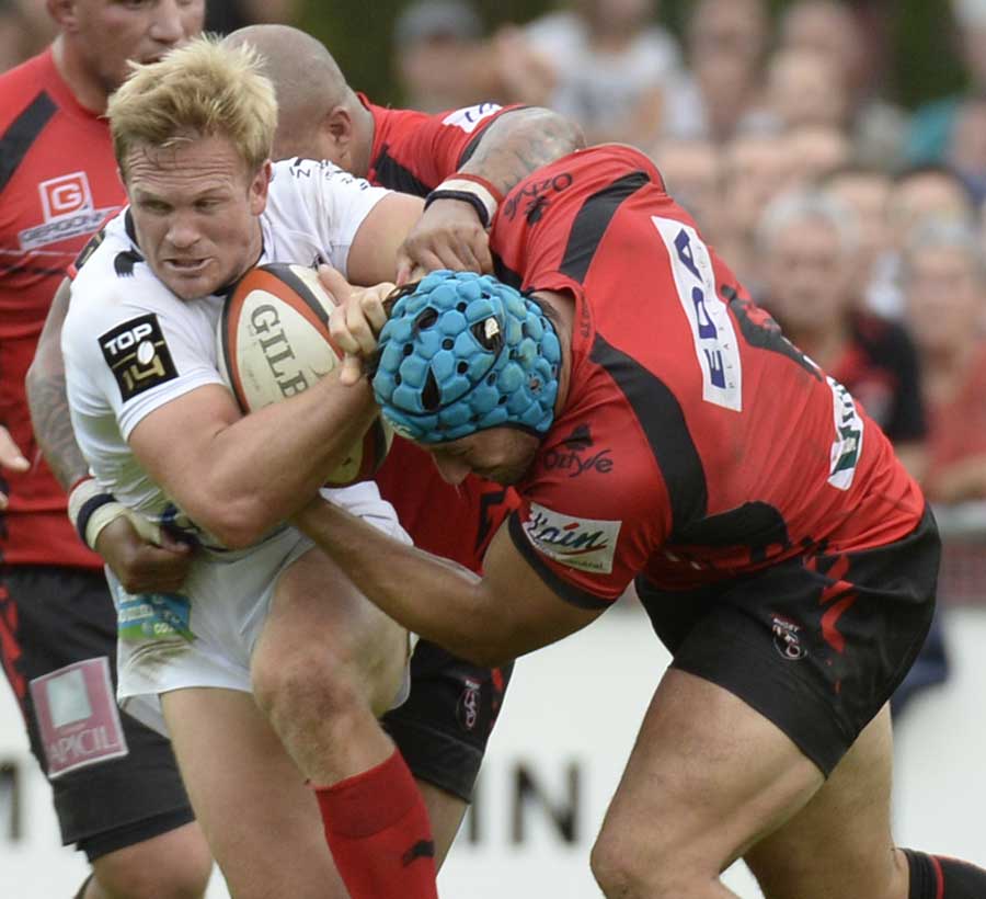 Toulon's Michael Claassens is halted by the Oyonnax defence