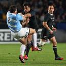 New Zealand's Julian Savea bounces out of a tackle from Eusebio Guinazu
