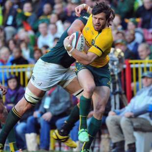 Wallabies centre Adam Ashley-Cooper is tackled, South Africa v Australia, Rugby Championship, Newlands, Cape Town, 28 September 2013