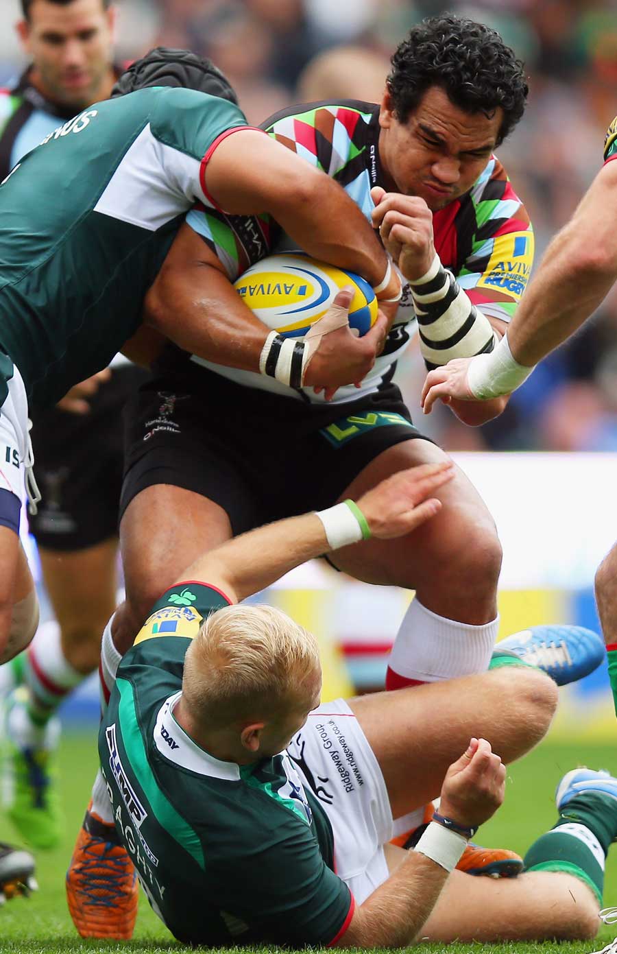 Harlequins' Maurie Fa'asavalu attempts to make some yards against London Irish