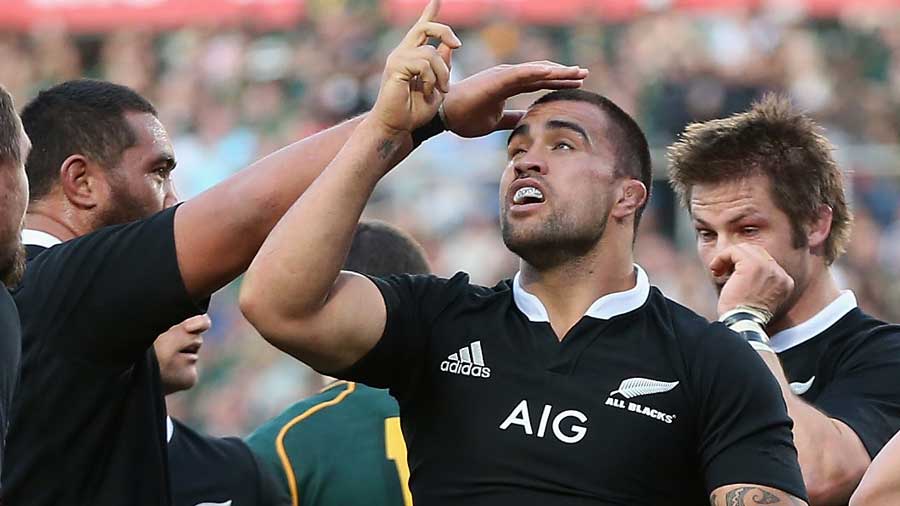New Zealand's Liam Messam is congratulated on his score