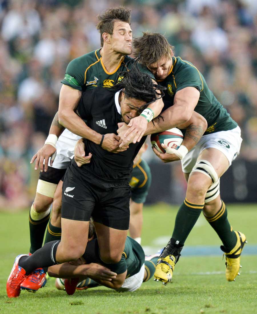 New Zealand's Ma'a Nonu is snuffled up by the South African defence
