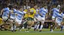 Australia's Israel Folau makes a break to score another try