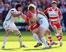 Billy Twelvetrees is tackled by Ian Whitten and Ben White 