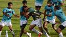 Indian rugby players tackle a Pakistani player