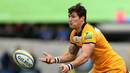 London Wasps' Guy Thompson wings the ball on