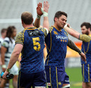 Charlie O'Connell and Ezra Taylor celebrate Otago's victory over Auckland