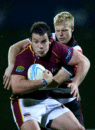 Southland's John Hardie is tackled by Counties Baden Kerr