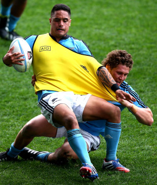 Aaron Smith is tackled by Tawera Kerr-Barlow  during a training session, Dunedin, October 17, 2013