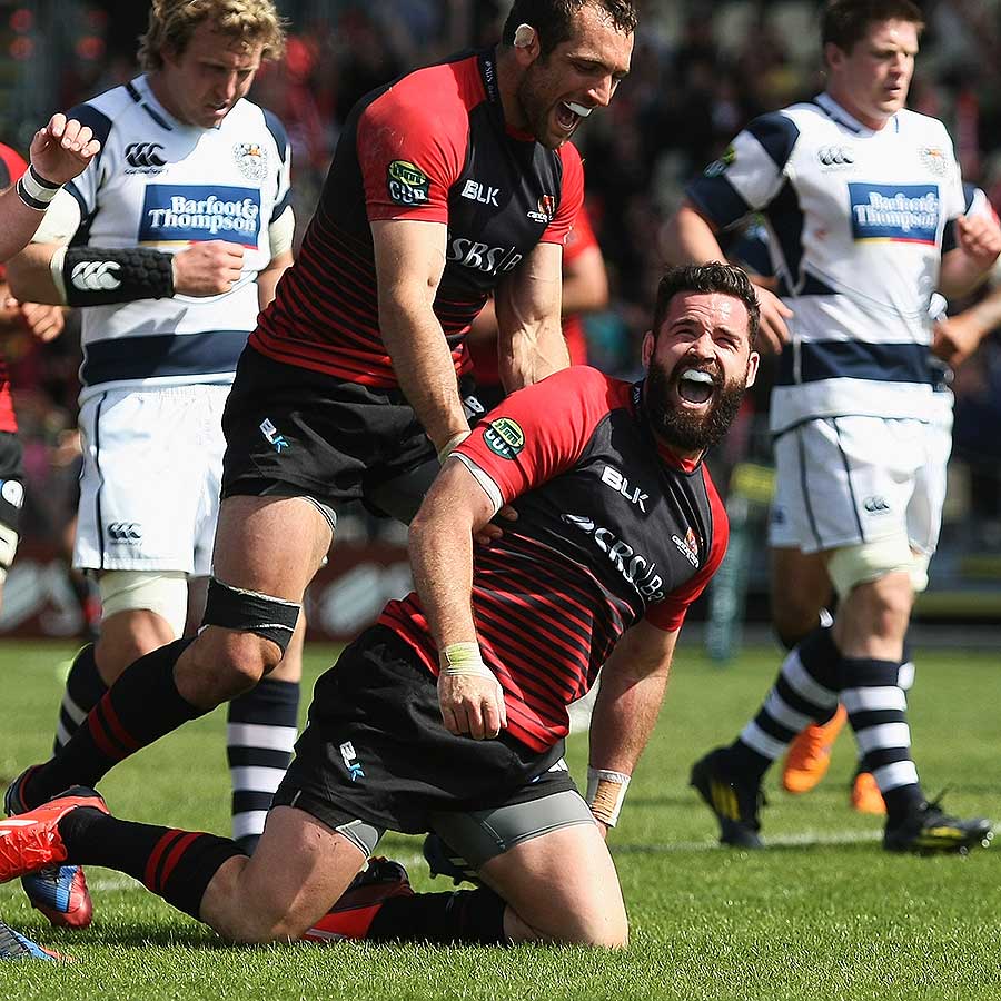 Canterbury's Ryan Crotty celebrates with teammate Adam Whitelock after scoring a try