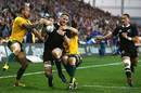 New Zealand's Kieran Read charges towards the line