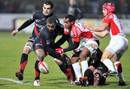 Toulouse centre Maleli Kunavore battles for the ball