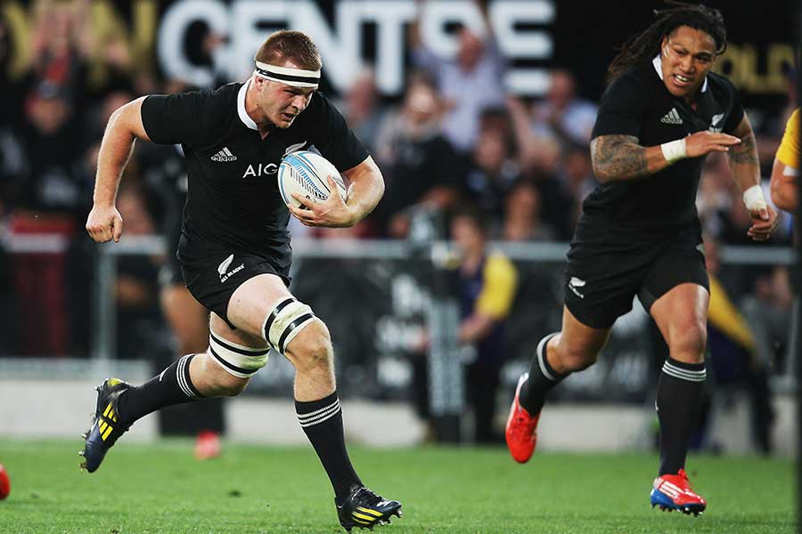 New Zealand's Sam Cane runs in to score a try