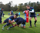 Billy Vunipola tackles Tom Wood during the England training session