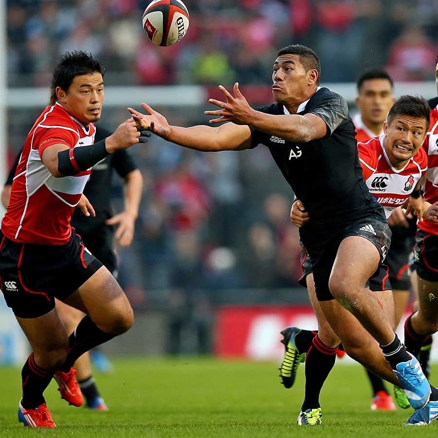 New Zealand's Charles Piutau collects a loose ball to score his first try