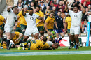 England celebrate as captain Chris Robshaw goes over to level the scores 