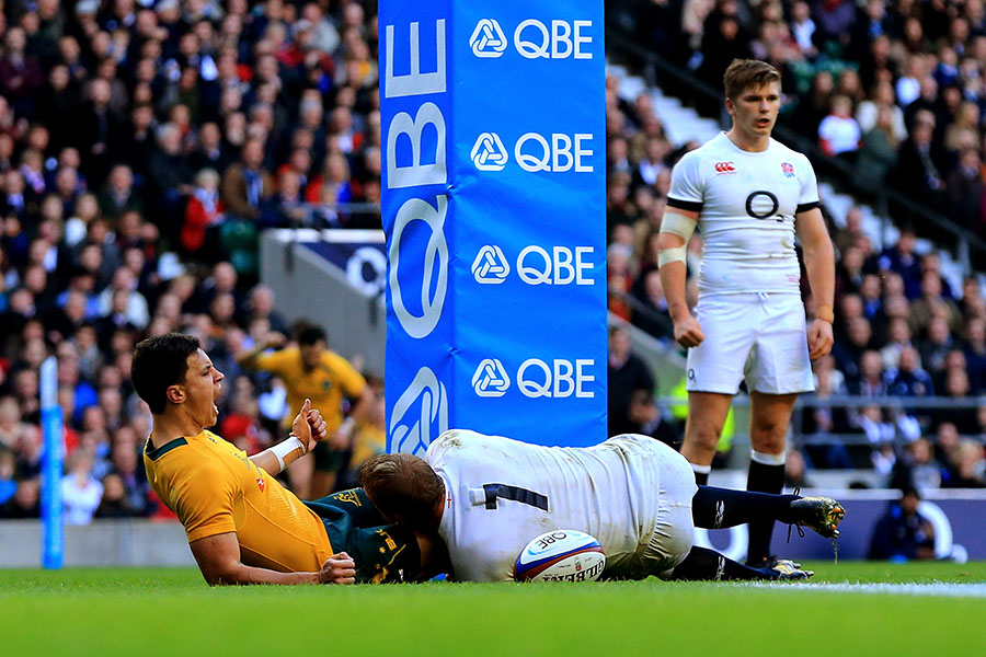 Australia's Matt Toomua celebrates after crossing for the opening try of the match against England