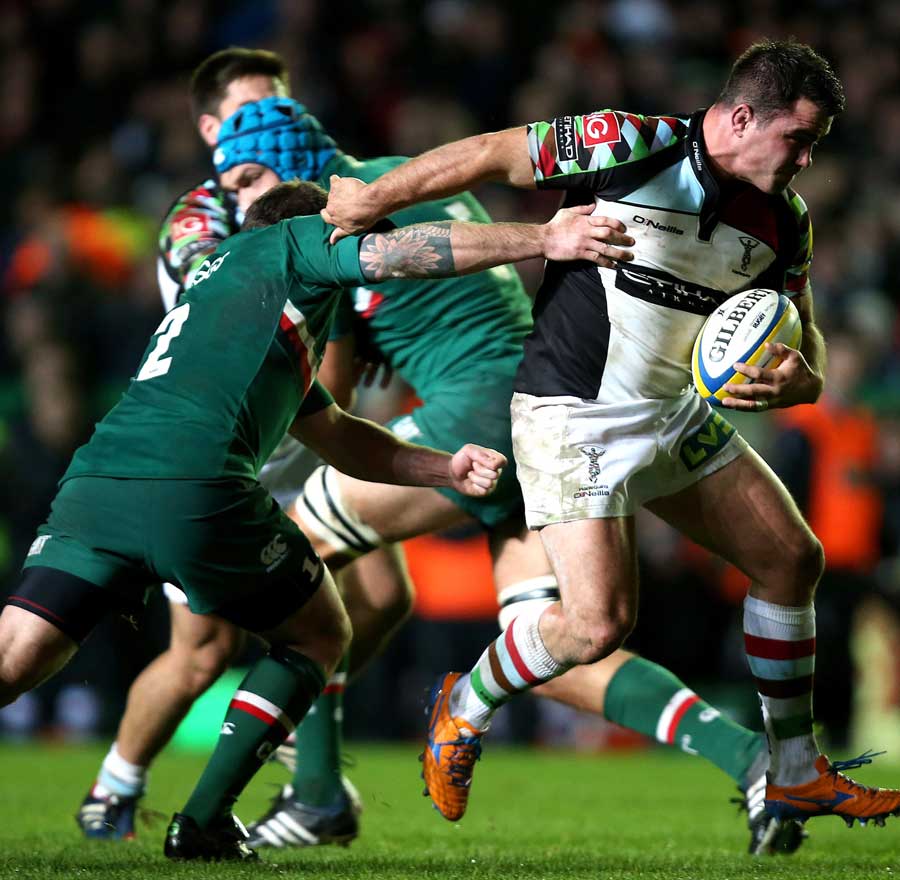 Harlequins' Dave Ward breaks away from Neil Briggs