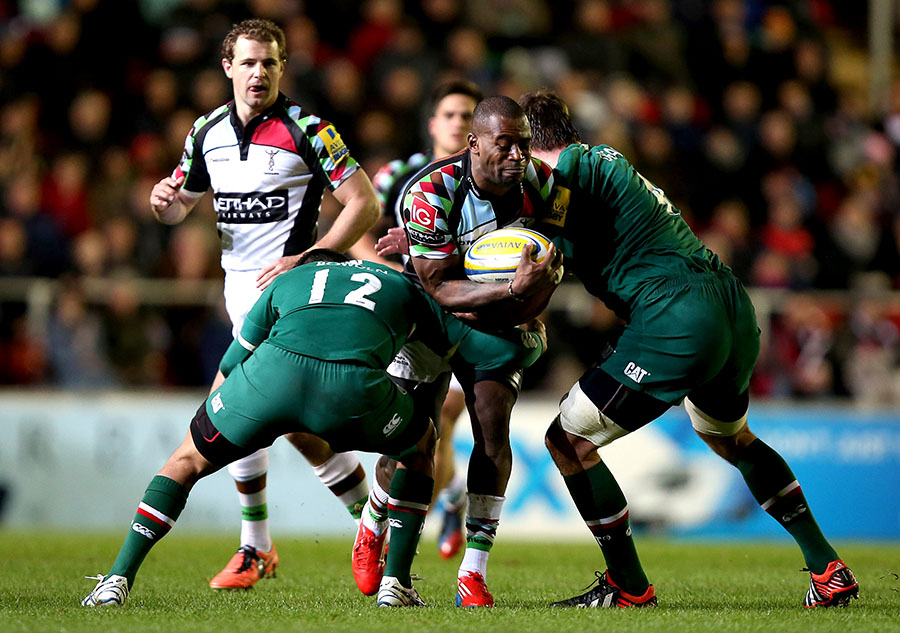 Ugo Monye is halted by Leicester Tigers centre Dan Bowden 