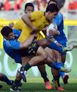 Australia's Matt Toomua makes some ground against Italy