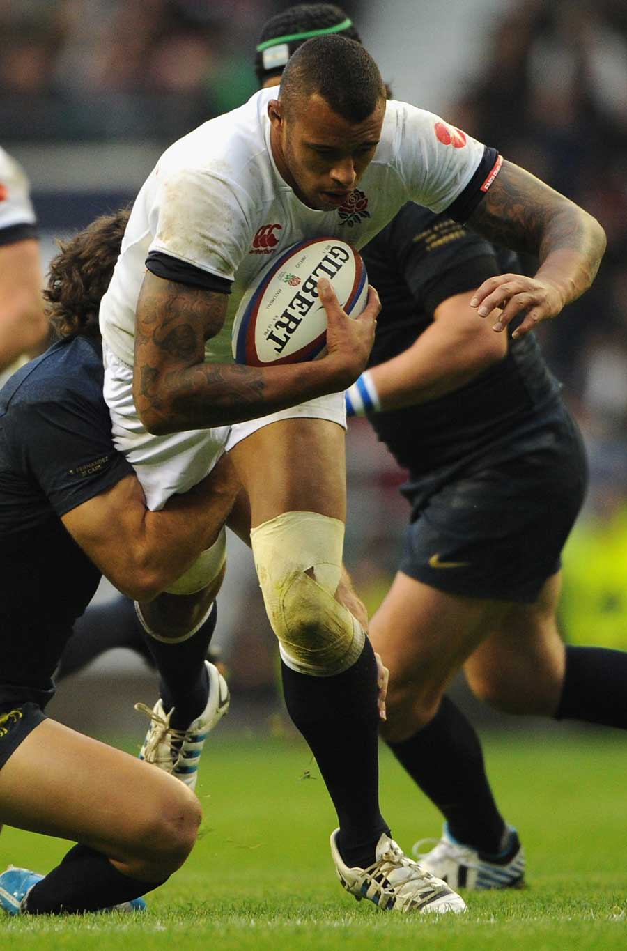 England's Courtney Lawes drives forward