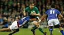 Ireland's Brian O'Driscoll tries to break through Samoa's defence