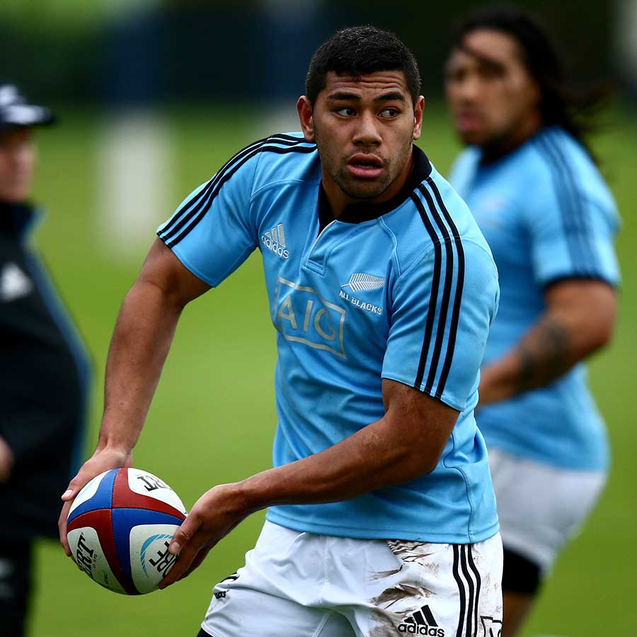 New Zealand's Charles Piutau passes the ball during an All Blacks training session
