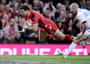 Mike Phillips leaps over the whitewash to put Wales in control against Argentina