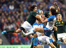 Willie le Roux jumps for the ball with Sean Maitland 