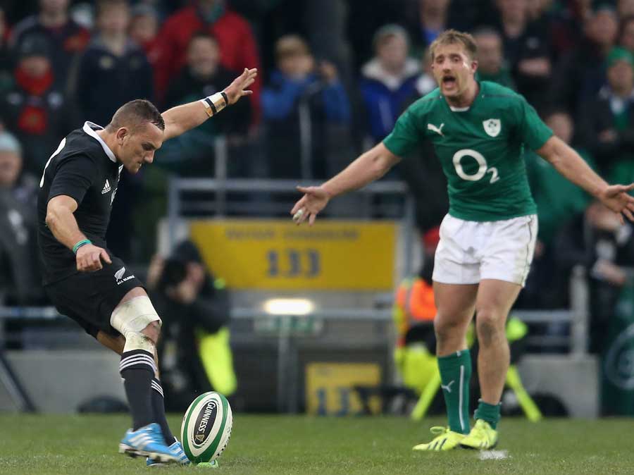 Ireland's Luke Fitzgerald charges at Aaron Cruden