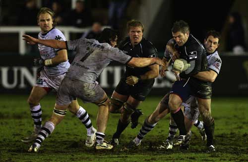 Newcastle fly-half Tom May takes on the Brive defence