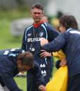 Leicester Tigers head coach Heyneke Meyer casts an eye over a training session