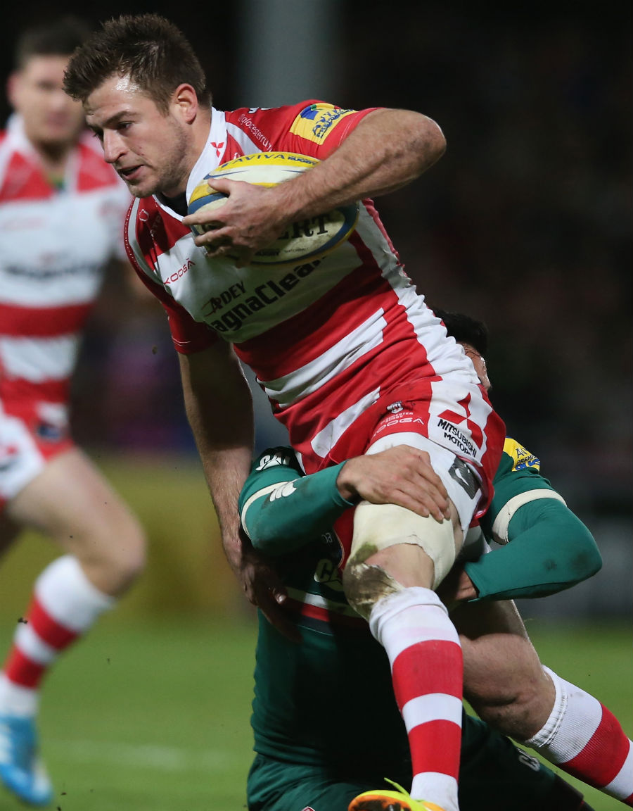 Gloucester's Henry Trinder carries forward against Leicester