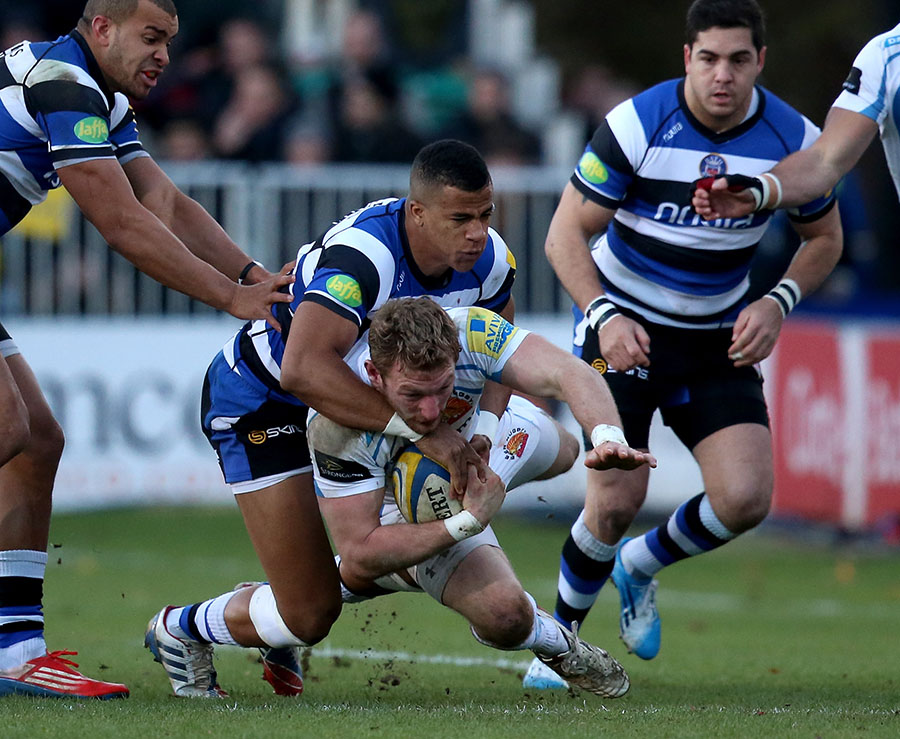 Anthony Watson gets up close and personal with Exeter's Matt Jess