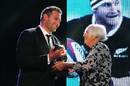 Pam Tremain presents Kieran Read with the trophy after he was named New Zealand Rugby Player of the Year