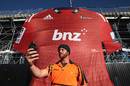 Joe Wilson takes a selfie in front of a giant Crusaders Super Rugby replica jersey