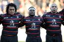 Toulouse players Cencus Johnston, Chiliboy Ralepelle and Gurthro Steenkamp observe a minute's silence to pay respect to Nelson Mandela