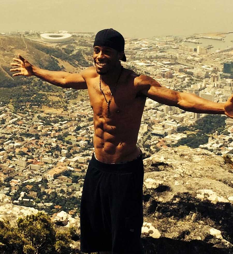 USA Sevens star Carlin Isles poses above Cape Town