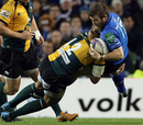 Luther Burrell sends Leinster's Gordon D'Arcy flying in Dublin