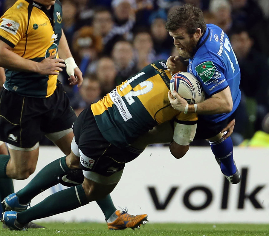 Luther Burrell sends Leinster's Gordon D'Arcy flying in Dublin